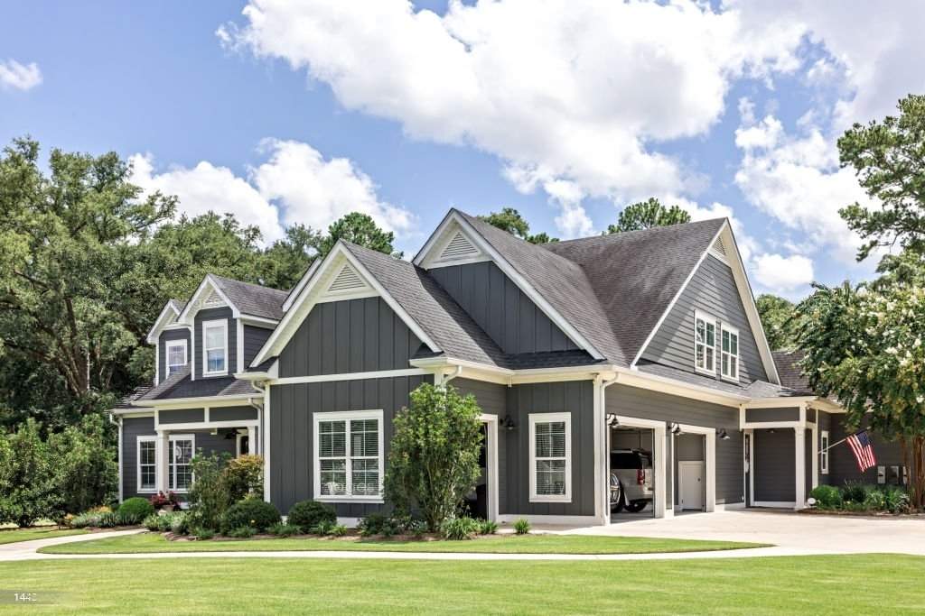 A recently completed roofing and exterior renovation by Elite Work Home Improvement & Roofing
